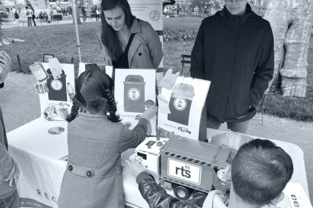 Recycle Track Systems employees at a local community fair